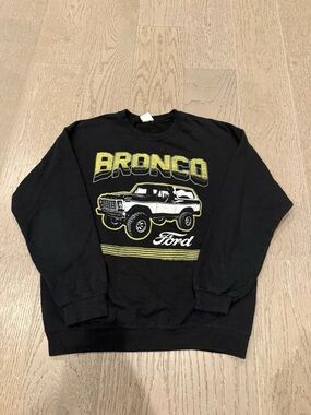 Junk Food Clothing Black Crewneck with Yellow Bronco Graphic